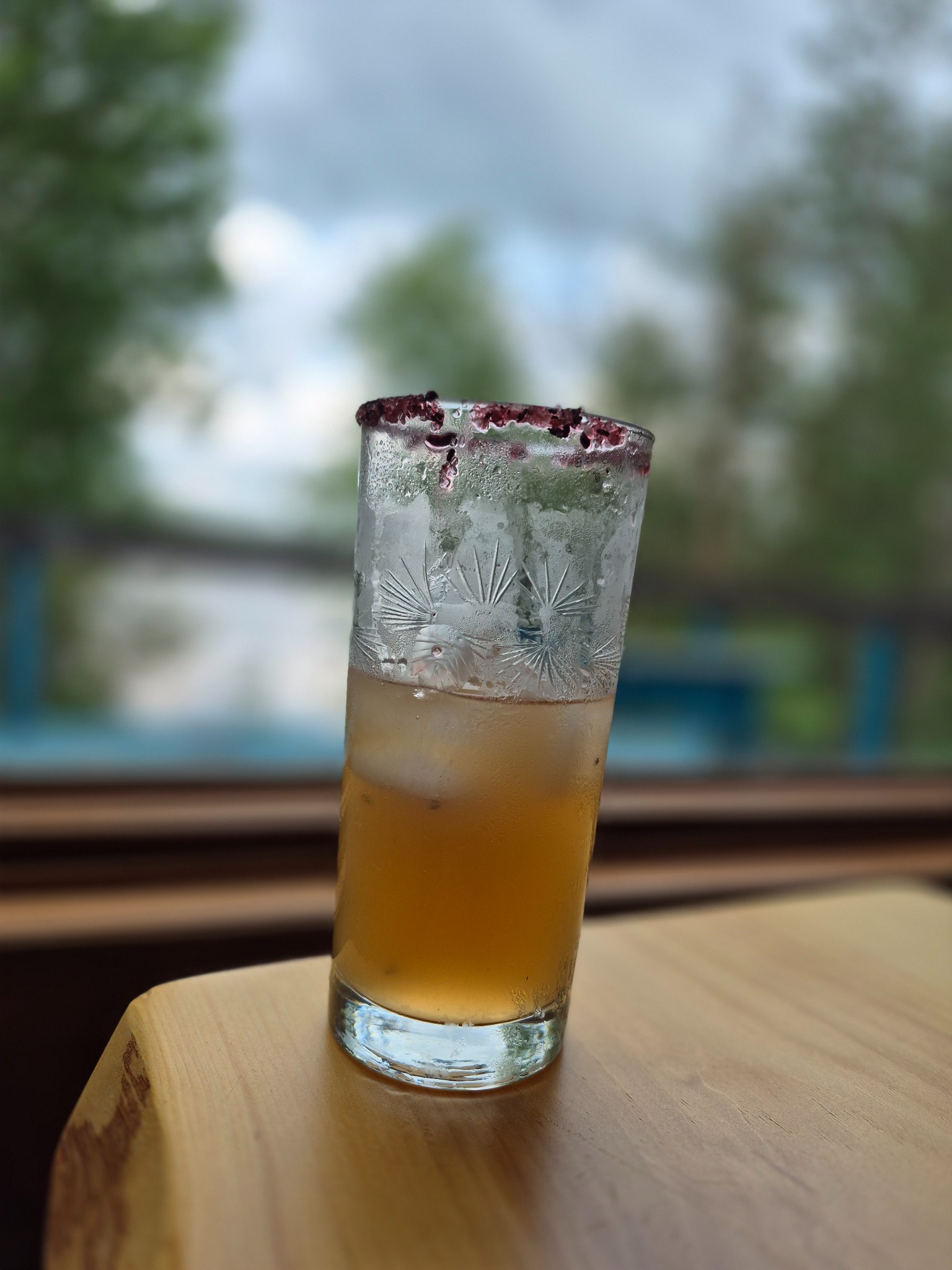 Cocktail in front of a lake view